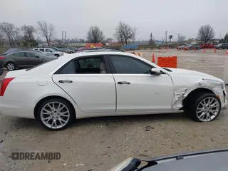 2014 Cadillac CTS Luxury AWD with VIN 1G6AX5S33E0156239, listed as a IAAI auction lot 41452922 with Not Provided miles and . Bid and sale history available at DreamBid. Image 14.