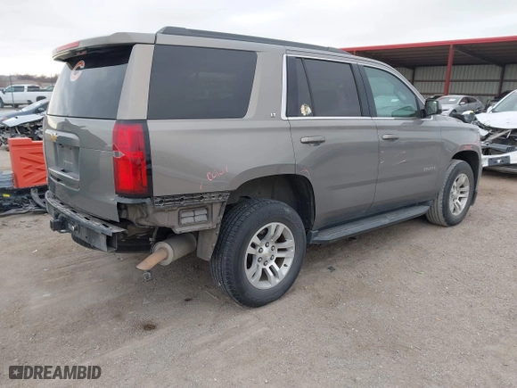 2017 Chevrolet Tahoe LT with VIN 1GNSCBKC0HR228016, listed as a IAAI auction lot 41232841 with 105,385 mi miles. Bid and sale history available at carsss.com. Image 4.