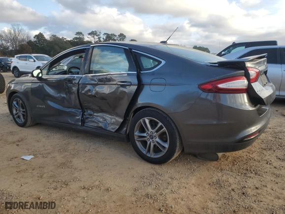 2015 Ford Fusion Titanium Hybrid with VIN 3FA6P0RU9FR172909, listed as a Copart auction lot 44025515 with 93,141 mi miles and Salvage Title. Bid and sale history available at carsss.com. Image 2.