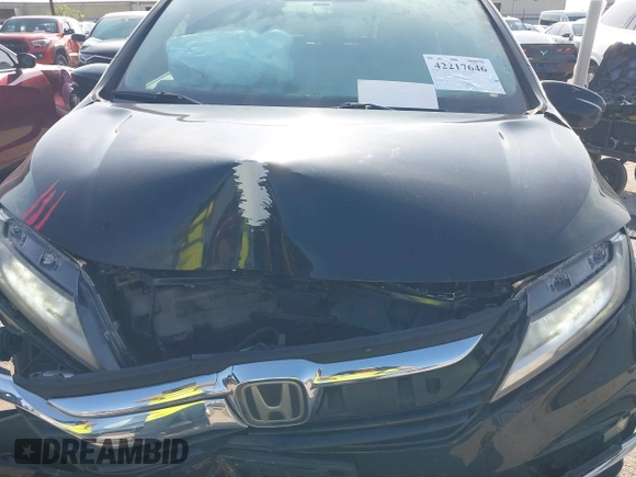 2019 Honda Odyssey Elite with VIN 5FNRL6H92KB089949, listed as a IAAI auction lot 42217646 with 61,193 mi miles and . Bid and sale history available at DreamBid. Image 12.