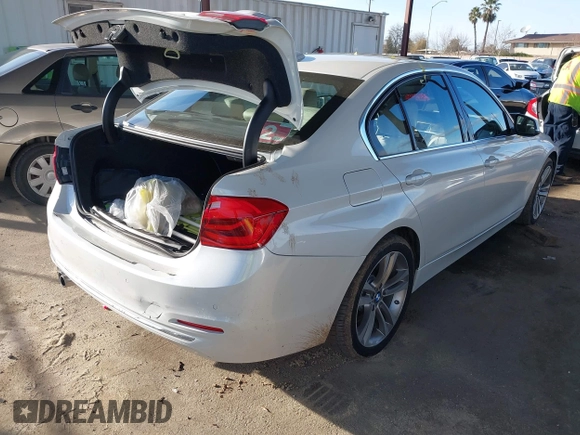 2016 BMW 3 Series 328i with VIN WBA8E9G58GNT47869, listed as a IAAI auction lot 41594120 with 57,561 mi miles. Bid and sale history available at carsss.com. Image 4.