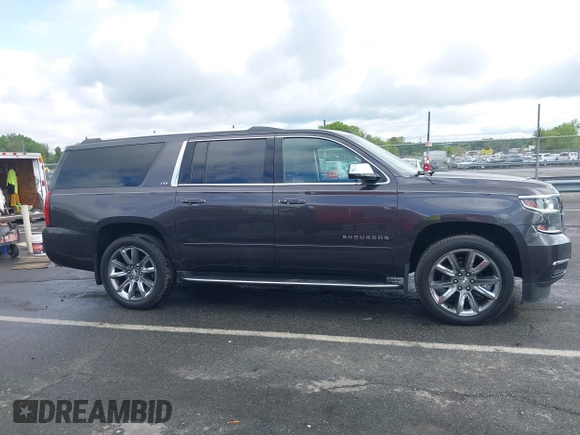 2015 Chevrolet Suburban LTZ with VIN 1GNSKKKC4FR589913, listed as a IAAI auction lot 42017190 with 216,145 mi miles. Bid and sale history available at carsss.com. Image 13.