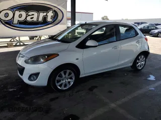 2011 Mazda 2 Touring z VIN JM1DE1HY4B0105159, wystawiony jako Copart lot #56929615 z przebiegiem 72 546 mil mil oraz Szkoda całkowita • Salvage title. Historia ofert i sprzedaży dostępna na DreamBid. Obrazek 1.