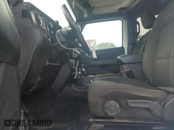 2019 Jeep Wrangler Unlimited Sahara с VIN 1C4HJXEG6KW580031, выставлен на аукционе Copart как лот 59687835 с пробегом 136 590 миль миль и Списание • Salvage title. История ставок и продаж доступна на DreamBid. Изображение 7.