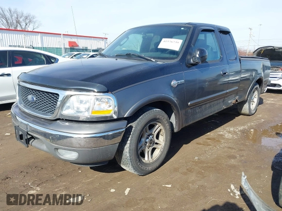 2003 Ford F-150 XL with VIN 1FTRX17W53NB00671, listed as a IAAI auction lot 41576739 with 194,066 mi miles. Bid and sale history available at carsss.com. Image 2.