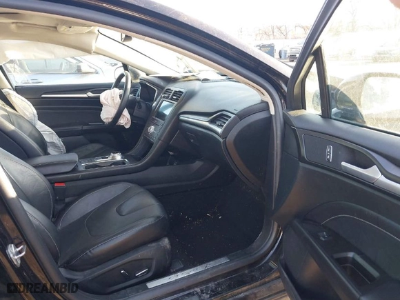 2020 Ford Fusion Hybrid Titanium with VIN 3FA6P0RU9LR141476, listed as a IAAI auction lot 41472921 with 84,433 mi miles. Bid and sale history available at carsss.com. Image 5.