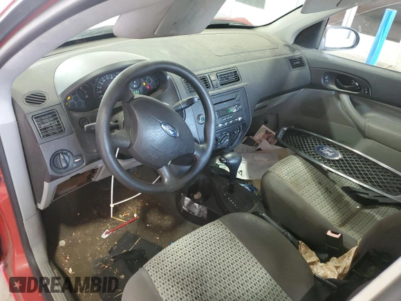 2007 Ford Focus S z VIN 1FAFP34N17W232021, wystawiony jako Copart lot #59553335 z przebiegiem 172 576 mil mil oraz Czysty tytuł • Clean title. Historia ofert i sprzedaży dostępna na DreamBid. Obrazek 8.