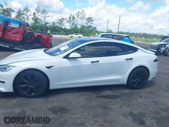 2021 Tesla Model S Plaid с VIN 5YJSA1E62MF438406, выставлен на аукционе IAAI как лот 42246901 с пробегом Не указан миль и . История ставок и продаж доступна на DreamBid. Изображение 14.