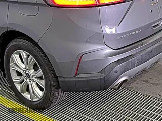 2021 Ford Edge Titanium z VIN 2FMPK3K92MBA53689, wystawiony jako IAAI lot #42501151 z przebiegiem 93 941 mil mil oraz . Historia ofert i sprzedaży dostępna na DreamBid. Obrazek 6.