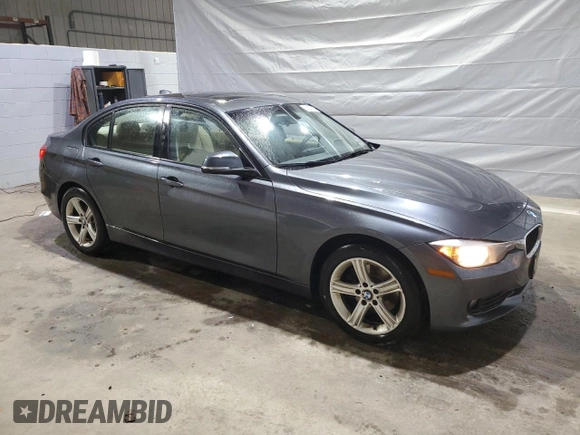 2015 BMW 3 Series 320i xDrive with VIN WBA3C3C52FP664472, listed as a Copart auction lot 55647585 with 129,934 mi miles and Salvage title. Bid and sale history available at DreamBid. Image 4.