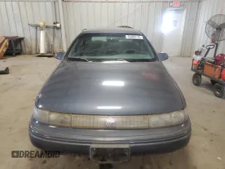 1994 Mercury Sable GS z VIN 1MELM50U0RA631872, wystawiony jako Copart lot #45880115 z przebiegiem 346 803 mil mil oraz Szkody całkowita. Historia ofert i sprzedaży dostępna na DreamBid. Obrazek 5.
