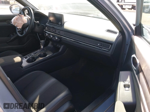 2024 Honda Civic Sport with VIN 2HGFE2F59RH562595, listed as a IAAI auction lot 41681632 with 18,217 mi miles and . Bid and sale history available at DreamBid. Image 5.