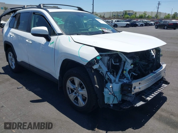 2019 Toyota RAV4 XLE with VIN JTMP1RFV8KD025971, listed as a IAAI auction lot 42673361 with 69,241 mi miles and . Bid and sale history available at DreamBid. Image 14.