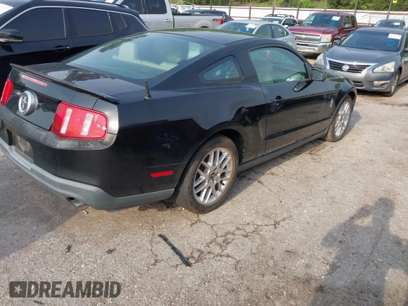 2012 Ford Mustang V6 Premium with VIN 1ZVBP8AM8C5220642, listed as a IAAI auction lot 42110826 with 106,322 mi miles. Bid and sale history available at carsss.com. Image 4.