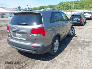 2012 Kia Sorento EX with VIN 5XYKUDA61CG244312, listed as a IAAI auction lot 42343888 with 164,520 mi miles and . Bid and sale history available at DreamBid. Image 4.