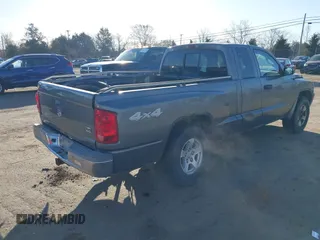 2005 Dodge Dakota SLT with VIN 1D7HW42N75S220495, listed as a IAAI auction lot 41825320 with 123,085 mi miles and . Bid and sale history available at DreamBid. Image 4.
