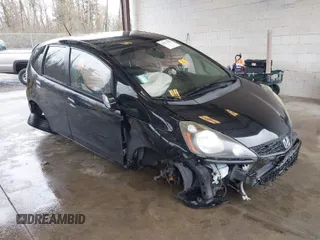2013 Honda Fit Sport with VIN JHMGE8H57DC033384, listed as a IAAI auction lot 41871356 with 150,777 mi miles. Bid and sale history available at carsss.com. Image 1.