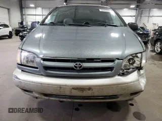 2000 Toyota Sienna LE z VIN 4T3ZF13C7YU284445, wystawiony jako Copart lot #52452465 z przebiegiem 150 609 mil mil oraz Szkoda całkowita • Salvage title. Historia ofert i sprzedaży dostępna na DreamBid. Obrazek 5.