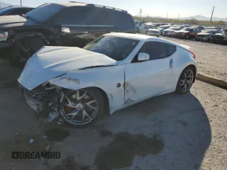2014 Nissan 370Z Touring with VIN JN1AZ4EH5EM635783, listed as a Copart auction lot 85475214 with 107,712 mi miles and Salvage Title. Bid and sale history available at carsss.com. Image 1.