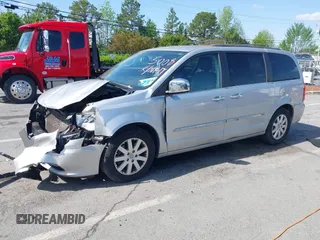 2012 Chrysler Town & Country Touring L with VIN 2C4RC1CG1CR245008, listed as a IAAI auction lot 41951680 with 98,656 mi miles and . Bid and sale history available at DreamBid. Image 2.