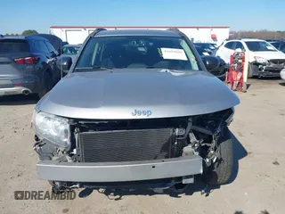 2016 Jeep Compass 75th Anniversary with VIN 1C4NJCBBXGD693892, listed as a IAAI auction lot 41651029 with 81,211 mi miles and . Bid and sale history available at DreamBid. Image 13.