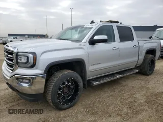 2017 GMC Sierra 1500 SLT z VIN 3GTU2NEJ3HG501403, wystawiony jako Copart lot #50764205 z przebiegiem 207 057 mil mil oraz Czysty tytuł • Clean title. Historia ofert i sprzedaży dostępna na DreamBid. Obrazek 1.