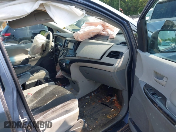 2013 Toyota Sienna LE with VIN 5TDJK3DC6DS070951, listed as a IAAI auction lot 42468510 with 235,537 mi miles and . Bid and sale history available at DreamBid. Image 5.