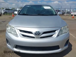 2011 Toyota Corolla L with VIN JTDBU4EE9B9156724, listed as a IAAI auction lot 42138344 with 96,486 mi miles and . Bid and sale history available at DreamBid. Image 6.