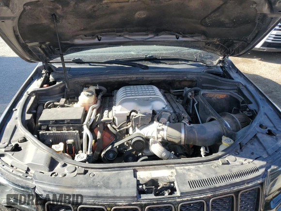 2018 Jeep Grand Cherokee Trackhawk with VIN 1C4RJFN96JC377074, listed as a Copart auction lot 53305975 with 27,625 mi miles and Salvage title. Bid and sale history available at DreamBid. Image 11.