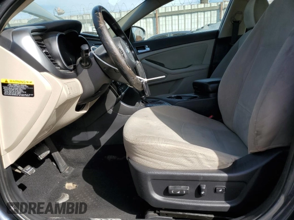 2015 Kia Optima Hybrid with VIN KNAGM4AD6F5083454, listed as a Copart auction lot 77230234 with 138,087 mi miles and Clean Title. Bid and sale history available at carsss.com. Image 7.