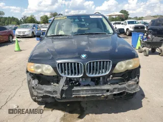 2004 BMW X5 3.0i with VIN 5UXFA13544LU20710, listed as a Copart auction lot 71647804 with 154,019 mi miles and Salvage Title. Bid and sale history available at carsss.com. Image 5.