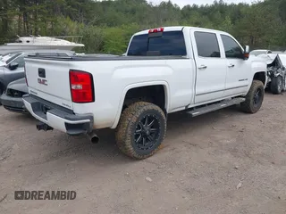 2016 GMC Sierra 2500HD Denali z VIN 1GT12UE82GF130096, wystawiony jako IAAI lot #41869448 z przebiegiem 129 659 mil mil oraz . Historia ofert i sprzedaży dostępna na DreamBid. Obrazek 4.