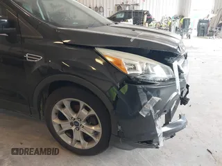 2014 Ford Escape Titanium с VIN 1FMCU0J9XEUA90770, выставлен на аукционе IAAI как лот 42354947 с пробегом 96 296 миль миль и . История ставок и продаж доступна на DreamBid. Изображение 13.