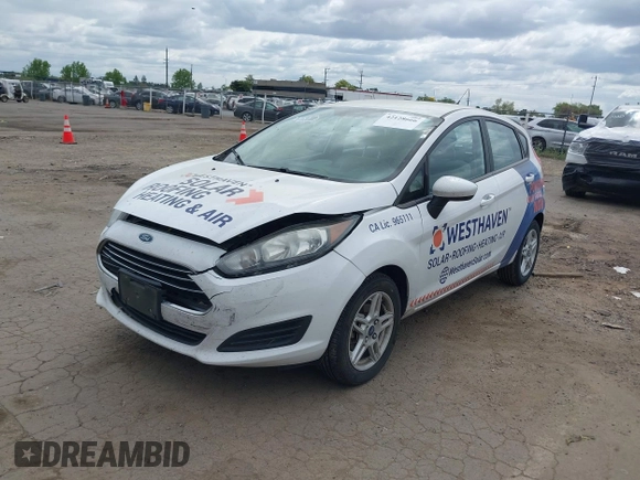 2018 Ford Fiesta SE with VIN 3FADP4EJ0JM143122, listed as a IAAI auction lot 42128666 with 146,747 mi miles and . Bid and sale history available at DreamBid. Image 2.