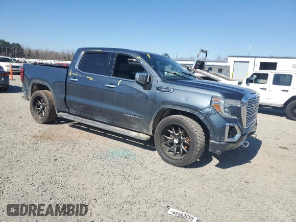 2019 GMC Sierra 1500 Denali with VIN 3GTU9FEDXKG277906, listed as a Copart auction lot 47025625 with 138,008 mi miles and Salvage title. Bid and sale history available at DreamBid. Image 4.
