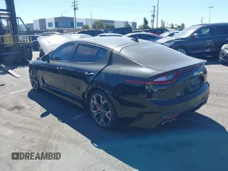 2018 Kia Stinger GT2 with VIN KNAE55LC9J6016753, listed as a IAAI auction lot 41408216 with 117,268 mi miles. Bid and sale history available at carsss.com. Image 3.