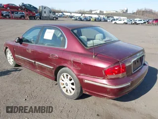 2002 Hyundai Sonata GLS with VIN KMHWF35H42A512538, listed as a IAAI auction lot 42000170 with 157,172 mi miles. Bid and sale history available at carsss.com. Image 3.