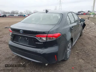 2022 Toyota Corolla Hybrid LE with VIN JTDEAMDEXNJ044413, listed as a IAAI auction lot 41556787 with 37,529 mi miles. Bid and sale history available at carsss.com. Image 4.