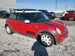 2004 MINI Hardtop with VIN WMWRC33434TC53820, listed as a Copart auction lot 85389994 with 164,452 mi miles and Salvage Title. Bid and sale history available at DreamBid. Image 4.