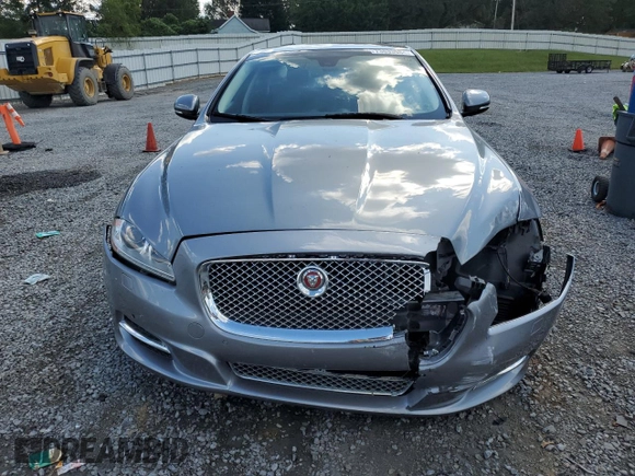 2015 Jaguar XJ Portfolio with VIN SAJWJ2GD2F8V75238, listed as a Copart auction lot 73633984 with 102,545 mi miles and Salvage title. Bid and sale history available at DreamBid. Image 5.