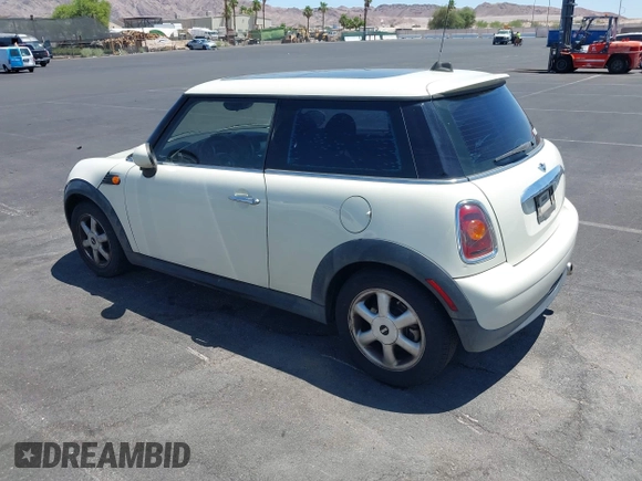 2007 MINI Hardtop with VIN WMWMF33567TU62285, listed as a IAAI auction lot 42517575 with 137,542 mi miles and . Bid and sale history available at DreamBid. Image 3.