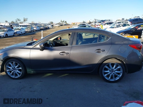 2014 Mazda 3 S Grand Touring with VIN JM1BM1W36E1112033, listed as a IAAI auction lot 41412655 with 115,050 mi miles and . Bid and sale history available at DreamBid. Image 14.