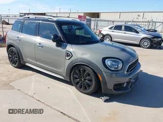 2018 MINI Countryman Cooper S z VIN WMZYT3C35J3E93291, wystawiony jako IAAI lot #41281432 z przebiegiem 58 774 mil mil oraz . Historia ofert i sprzedaży dostępna na DreamBid. Obrazek 1.