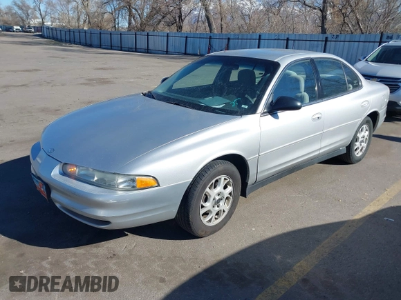 2002 Oldsmobile Intrigue GX z VIN 1G3WH52H02F104930, wystawiony jako IAAI lot #41882923 z przebiegiem 187 601 mil mil oraz . Historia ofert i sprzedaży dostępna na DreamBid. Obrazek 2.