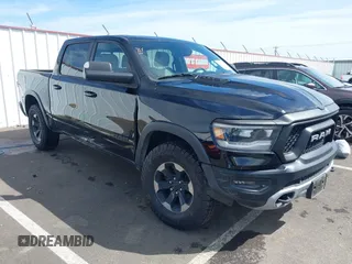 2019 Ram 1500 Rebel with VIN 1C6SRFLT2KN592652, listed as a IAAI auction lot 41989054 with 71,630 mi miles and . Bid and sale history available at DreamBid. Image 1.