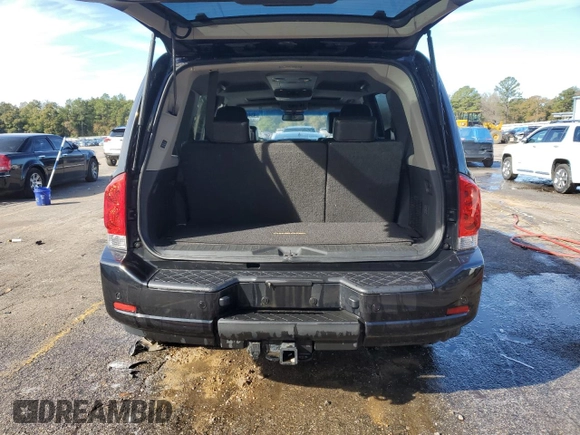 2014 Nissan Armada Platinum z VIN 5N1BA0NF8EN612889, wystawiony jako Copart lot #43404625 z przebiegiem 237 289 mil mil oraz Szkoda całkowita • Salvage title. Historia ofert i sprzedaży dostępna na DreamBid. Obrazek 6.