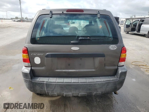2005 Ford Escape XLS Value with VIN 1FMYU02Z35KA59568, listed as a Copart auction lot 71720604 with 184,007 mi miles and Salvage Title. Bid and sale history available at carsss.com. Image 6.