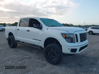 2019 Nissan Titan Pro-4X z VIN 1N6AA1E52KN534356, wystawiony jako IAAI lot #41998653 z przebiegiem 95 052 mil mil oraz . Historia ofert i sprzedaży dostępna na DreamBid. Obrazek 1.