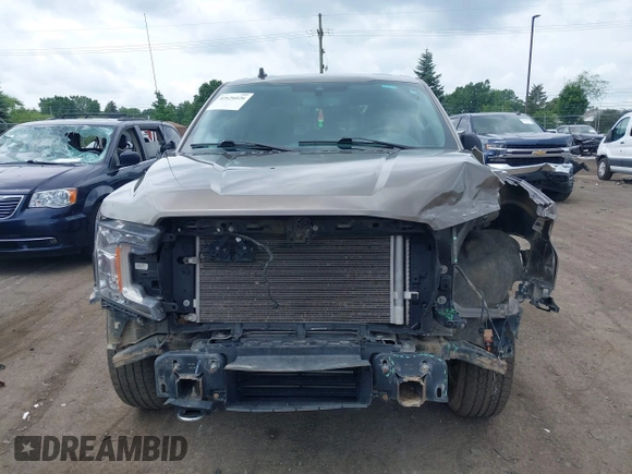 2020 Ford F-150 XL with VIN 1FTEW1EP1LFC03447, listed as a IAAI auction lot 42626026 with 111,525 mi miles and . Bid and sale history available at DreamBid. Image 12.