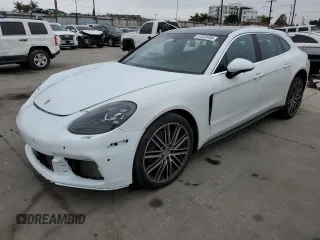 2018 Porsche Panamera z VIN WP0CB2A76JL190224, wystawiony jako Copart lot #57529795 z przebiegiem 118 594 mil mil oraz Szkody całkowita. Historia ofert i sprzedaży dostępna na DreamBid. Obrazek 1.